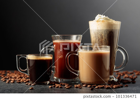 Various coffee and chocolate drinks on a black table. Various coffee and chocolate drinks on a black table. 101336471