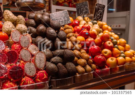 Fresh coconuts, pitahaya, avocado, apple and other fruits and vegetables at the farmers market Fresh coconuts, pitahaya, avocado, apple and other fruits and vegetables at the farmers market 101337565