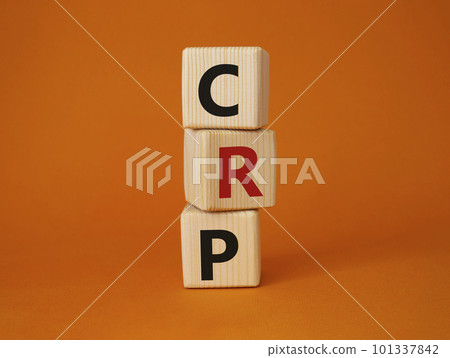 CRP - C-Reactive Protein Test symbol. Wooden cubes with word CRP. Beautiful orange background. Medical and C-Reactive Protein Test concept. Copy space. 101337842