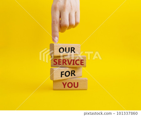 Our service for you symbol. Wooden blocks with words Our service for you. Beautiful yellow background. Businessman hand. Business and Our service for you concept. Copy space. Our service for you symbol. Wooden blocks with words Our service for you. Beautiful yellow background. Businessman hand. Business and Our service for you concept. Copy space. 101337860