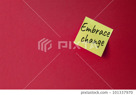 Embrace change symbol. Orange steaky note with concept words Embrace change. Beautiful red background. Business and Embrace change concept. Copy space 101337970