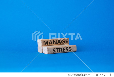 Manage stress symbol. Concept word Manage stress on wooden blocks. Beautiful blue background. Business and Manage stress concept. Copy space Manage stress symbol. Concept word Manage stress on wooden blocks. Beautiful blue background. Business and Manage stress concept. Copy space 101337991