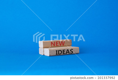 New ideas symbol. Concept word New ideas on wooden blocks. Beautiful blue background. Business and New ideas concept. Copy space New ideas symbol. Concept word New ideas on wooden blocks. Beautiful blue background. Business and New ideas concept. Copy space 101337992