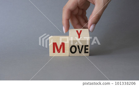 My Move symbol. Businessman hand Turnes cubes with words My Move. Beautiful grey background. Business and My Move concept. Copy space 101338206