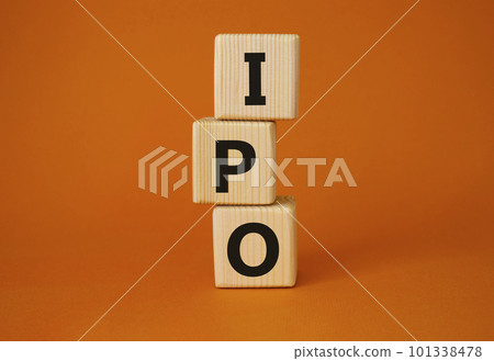 IPO- Initial Public Offering symbol. Concept word IPO on wooden cubes. Beautiful orange background. Business and IPO concept. Copy space. 101338478