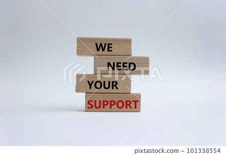 We need your support symbol. Wooden blocks with words We need your support. Beautiful white background. Business and We need your support concept. Copy space. 101338554