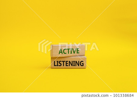 Active listening symbol. Wooden blocks with words Active listening. Beautiful yellow background. Business and Active listening concept. Copy space. 101338684