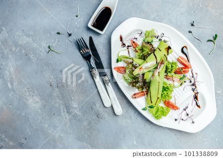 Green spinach crepes or pancakes with smoked salmon and soft cheese. banner, menu, recipe, place for text Green spinach crepes or pancakes with smoked salmon and soft cheese. banner, menu, recipe, place for text 101338809