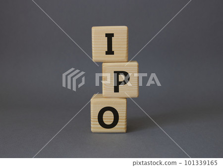 IPO- Initial Public Offering symbol. Concept word IPO on wooden cubes. Beautiful grey background. Business and IPO concept. Copy space. IPO- Initial Public Offering symbol. Concept word IPO on wooden cubes. Beautiful grey background. Business and IPO concept. Copy space. 101339165