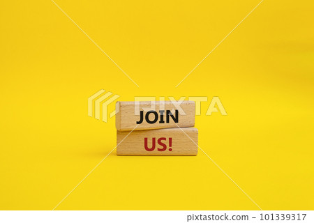 Join us symbol. Concept word Join us on wooden blocks. Beautiful yellow background. Business and Join us concept. Copy space 101339317