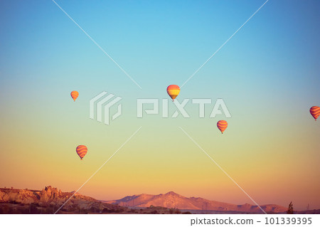 Flying hot air balloons Flying hot air balloons 101339395