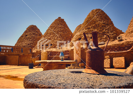 Beehive houses opposite bright clear sky Beehive houses opposite bright clear sky 101339527