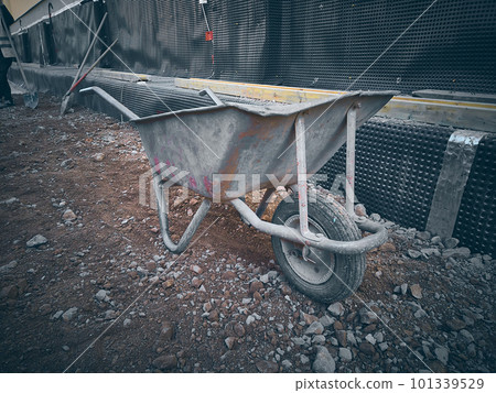 Wheelbarrow at construction site Wheelbarrow at construction site 101339529