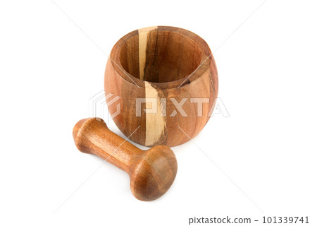 Wooden mortar and pestle isolated on white. 101339741