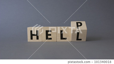 Help vs Hell symbol. Turned wooden cube with words Hell and Help. Beautiful grey background. Psychology and Help vs Hell concept. Copy space 101340018