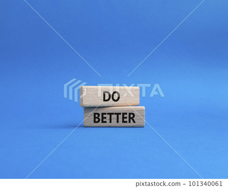 Do better symbol. Wooden blocks with words Do better. Beautiful blue background. Business and Do better concept. Copy space. Do better symbol. Wooden blocks with words Do better. Beautiful blue background. Business and Do better concept. Copy space. 101340061