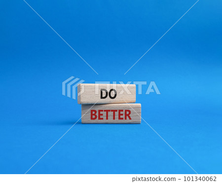 Do better symbol. Wooden blocks with words Do better. Beautiful blue background. Business and Do better concept. Copy space. Do better symbol. Wooden blocks with words Do better. Beautiful blue background. Business and Do better concept. Copy space. 101340062