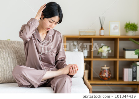 Young woman suffering from athlete's foot Young woman suffering from athlete's foot 101344439