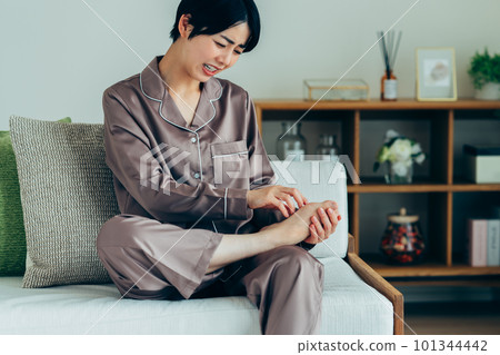 Young woman suffering from athlete's foot 101344442