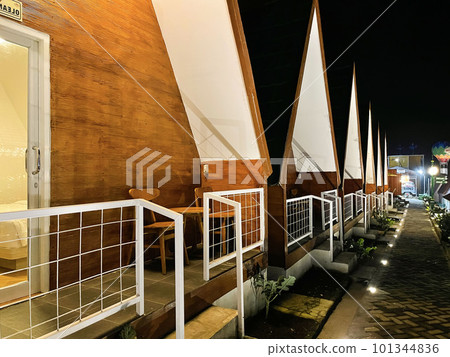 Bright houses during the midnight in the middle of farm in java tawang mangu central java indonesia 101344836
