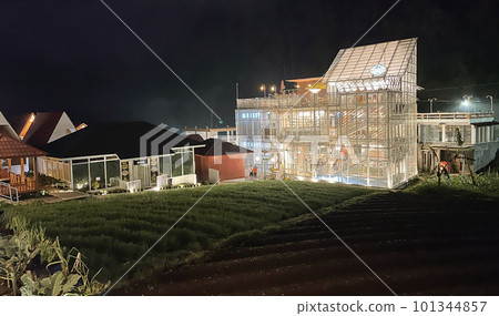 Bright houses during the midnight in the middle of farm in java tawang mangu central java indonesia Bright houses during the midnight in the middle of farm in java tawang mangu central java indonesia 101344857