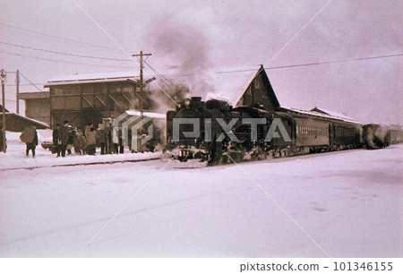 1971 D51 towed local train arriving at Kutchan station Hakodate main line Hokkaido documentary photo 101346155