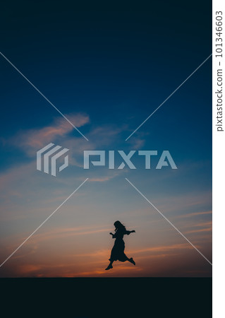 silhouette woman jumping 101346603