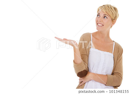 Presenting an awesome product. A pretty young woman presenting an awesome product to you while isolated on a white background. 101348155