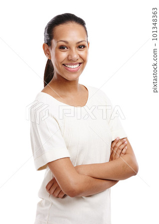Confident, woman and arms crossed with smile for happy career goals or profile against a white studio background. Portrait of young isolated female model posing with crossed arms in confidence 101348363