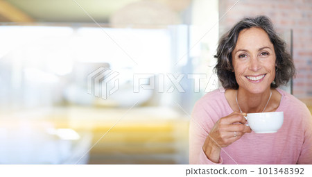Portrait, mockup and senior woman drinking coffee or tea in the morning happy, relax and smiling in cafe. Elderly, old and female enjoying an espresso on retirement feeling calm and confident Portrait, mockup and senior woman drinking coffee or tea in the morning happy, relax and smiling in cafe. Elderly, old and female enjoying an espresso on retirement feeling calm and confident 101348392