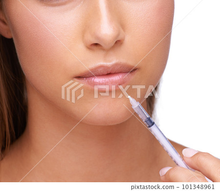 Beauty, botox and woman with needle for lips isolated on white background for treatment, lip filler and injection. Cosmetics, makeup and face zoom of girl for plastic surgery, skincare and collagen 101348961