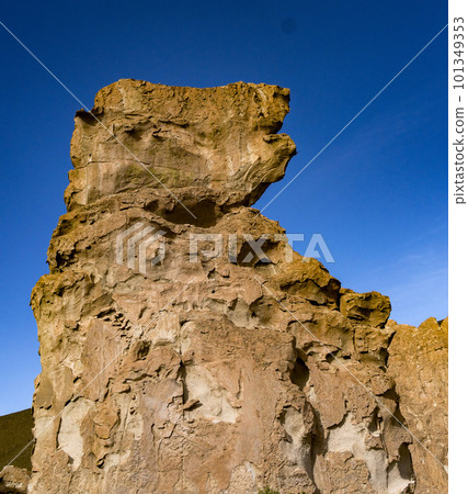 Rock formations in Bolivia at 16,000 feet elevation, carved by constant wind Rock formations in Bolivia at 16,000 feet elevation, carved by constant wind 101349353