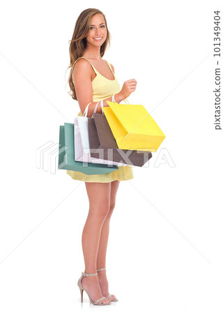Portrait, shopping sale with a woman customer in studio isolated on a white background for retail. Sales, fashion and shopping bags with a female inside to shop for a bargain, deal or discount 101349404
