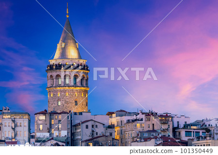 Galata Tower at twilight, Galata Tower in Istanbul beautiful landmark at evening, Galata tower at Karakoy district and Golden Horn Turkiye, istanbul, Turkey. 101350449
