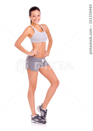 Healthy, beautiful and confident. Portrait of an attractive and sporty young woman against a white background. 101350493
