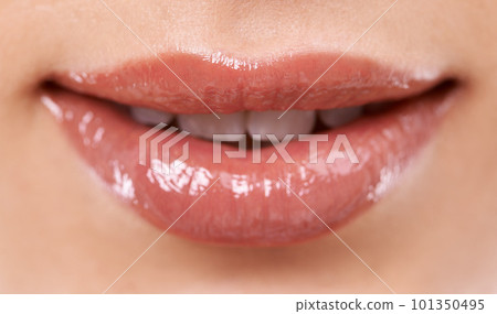 Thats a perfect smile. a womans mouth and teeth. 101350495
