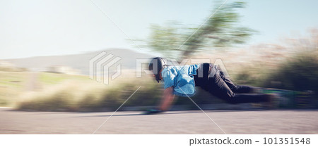 Speed, skateboard and man in action on road ready for adventure, freedom and extreme sports motion blur. Training, skateboarding and skater with longboard for exercise, skating and fitness hobby 101351548