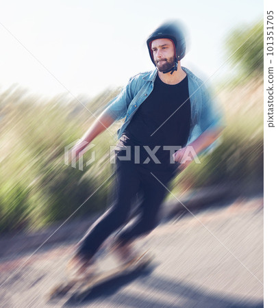 Motion blur, skateboard and balance with a sports man training outdoor on an asphalt street at speed. Skating, speed and movement with a male skater on a road for fun, freedom or training outside Motion blur, skateboard and balance with a sports man training outdoor on an asphalt street at speed. Skating, speed and movement with a male skater on a road for fun, freedom or training outside 101351705