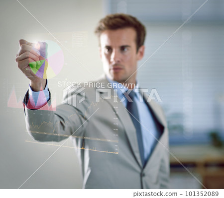 Plotting his business development. a businessman using a digital interface. 101352089