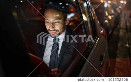 Travel, tablet and business man in car on social media, internet browsing or working. Transport, night and young male professional with digital technology for networking, web scrolling or research. Travel, tablet and business man in car on social media, internet browsing or working. Transport, night and young male professional with digital technology for networking, web scrolling or research. 101352306