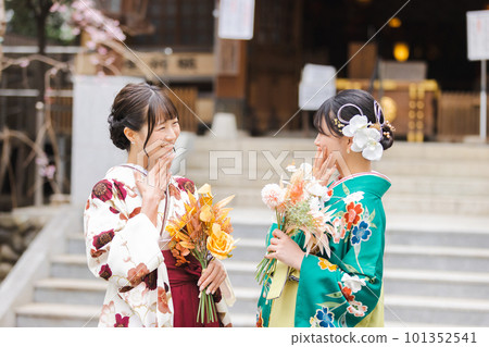 Girl wearing kimono and hakama Girl wearing kimono and hakama 101352541