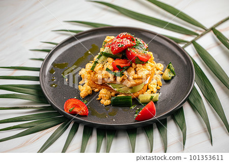 Breakfast toast with salad and scrambled egg Breakfast toast with salad and scrambled egg 101353611