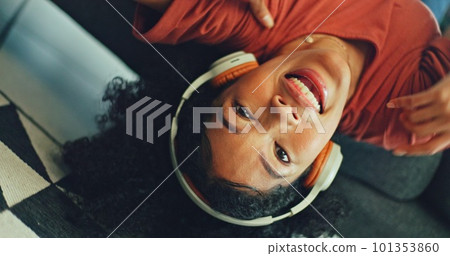 Headphones, listening and dance of black woman on a sofa excited for subscription service, technology and home connection. Happy, relax and girl portrait dancing on couch while listening to music app Headphones, listening and dance of black woman on a sofa excited for subscription service, technology and home connection. Happy, relax and girl portrait dancing on couch while listening to music app 101353860