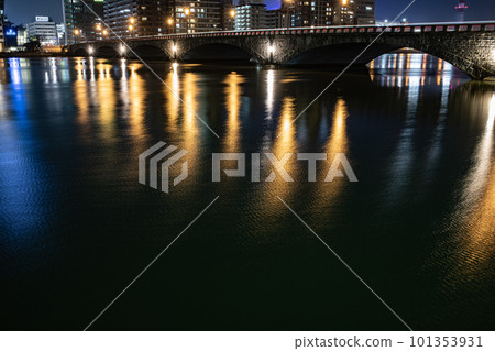 Buildings reflected on the surface of the water Buildings reflected on the surface of the water 101353931