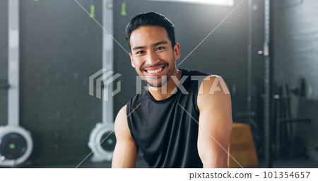 Fitness, exercise and laughing with a man in a gym for a workout or training to get strong or healthy. Wellness, smile and portrait with a happy young male athlete in a health club for exercising Fitness, exercise and laughing with a man in a gym for a workout or training to get strong or healthy. Wellness, smile and portrait with a happy young male athlete in a health club for exercising 101354657