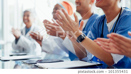 Applause, meeting and team of doctors and nurses hands in celebration, thank you and support of hospital success, goals and announcement. Conference, healthcare and medical worker clapping in clinic 101355431