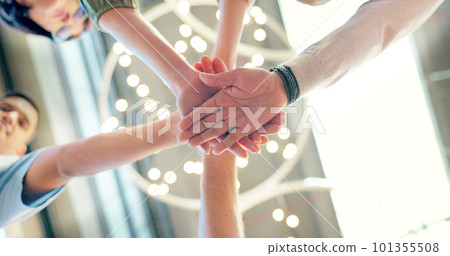 Teamwork, collaboration and low angle of business people with hands together in office. Team building, solidarity and group of employees huddle for unity, union and motivation, goals and targets. 101355508