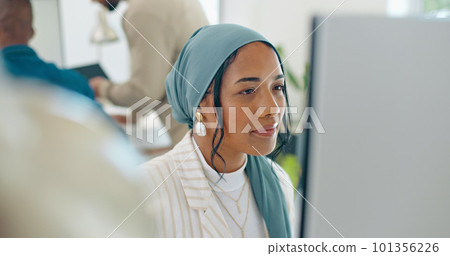 Woman, startup and desk with computer, reading and coding in modern office with islamic headscarf. Muslim programming expert, developer and web design worker with vision, tech solution and happiness 101356226