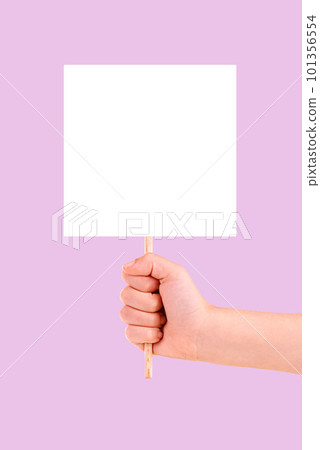 Hands, billboard and mockup for advertising, branding or marketing against a pink studio background. Hand holding stick poster, placard or empty banner for message, text or logo brand on copy space 101356554