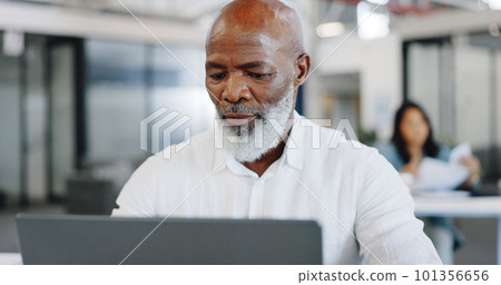Laptop, office and african businessman with company financial research, kpi review and online report in focus, mission and goals. Senior corporate employee working on pc technology at desk workspace 101356656